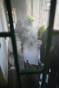 Mosógép egett egy IX. kerületi társasházban